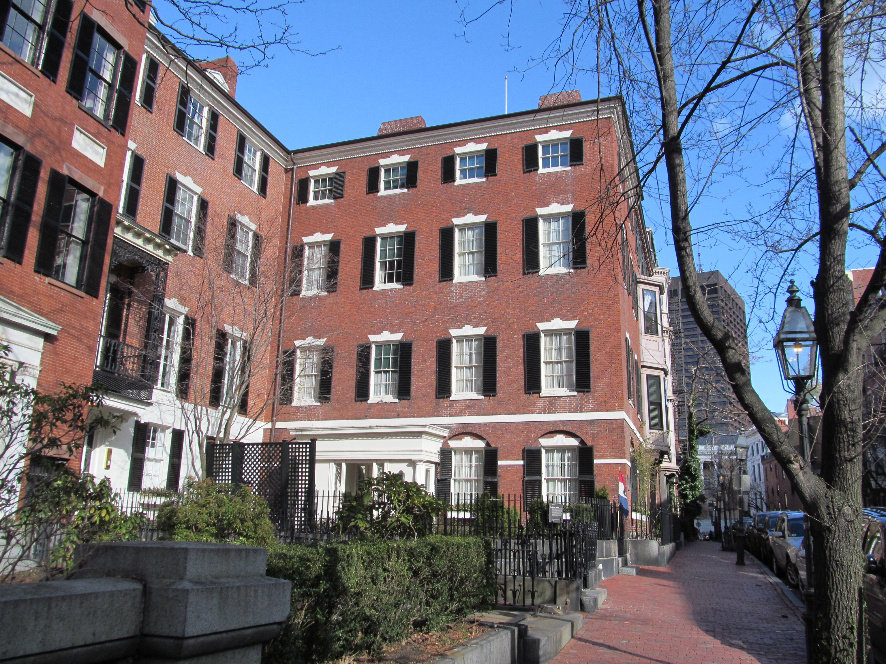 A Beacon Hill Federal bowfront with curved bay and recessed entry