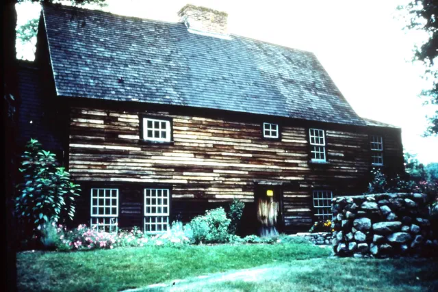 First Period houses are the earliest surviving English-built homes in America — fewer than 250 remain, almost all in Massachusetts. Massive central chimneys, post-medieval framing, riven oak clapboards.